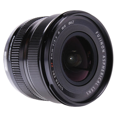 Fujifilm XF 8mm f3.5 R WR front three-quarter view from opposite side