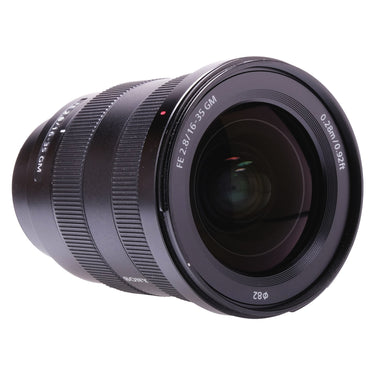 Sony FE 16-35mm F2.8 GM angled front view of front element and barrel