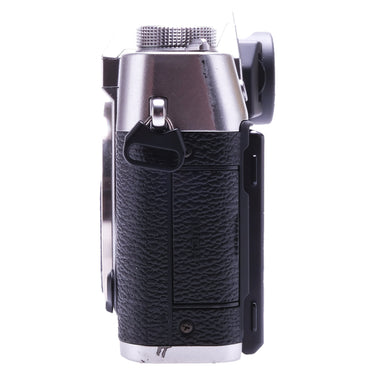 Fujifilm X-T30 left side showing strap lug and port door
