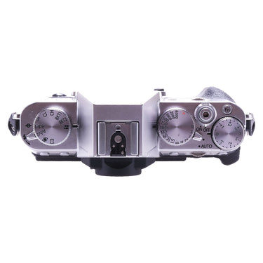 Fujifilm X-T30 top plate with shutter speed, drive, and exposure dials and hot shoe