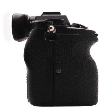 Sony A9 II right side showing textured grip, strap lug, and NFC logo