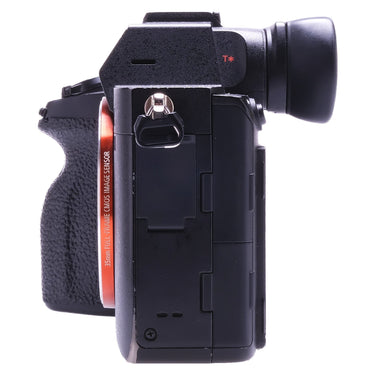 Sony a7R IV right side with battery and memory card door