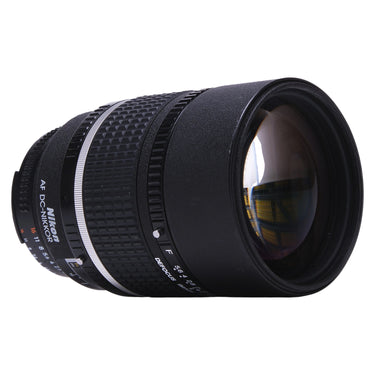 Nikon 135mm f2 AF DC-Nikkor side view showing front glass and barrel controls