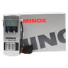 Minox MD 6x16A monocular front view with LCD display and SELECT and UNITS buttons, beside its original Minox box with lanyard