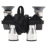 Minox BD 6x20 CP compact binocular side view with eyecups up and lanyard wrapped around