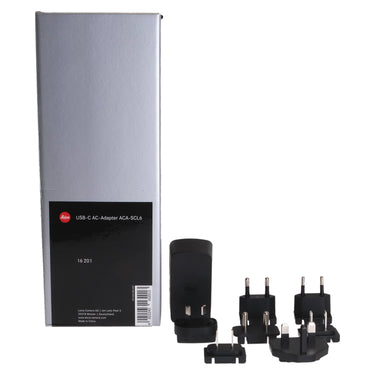 Leica ACA-SCL6 original box with model label alongside the adapter and plug adapters