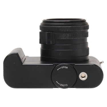 Leica Q2 Monochrom left side showing base open and close dial and lens barrel