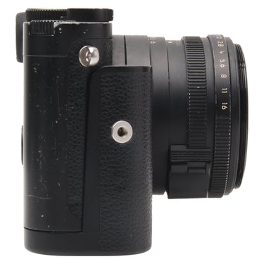 Leica Q2 Monochrom right side with handgrip showing paint loss and aperture ring