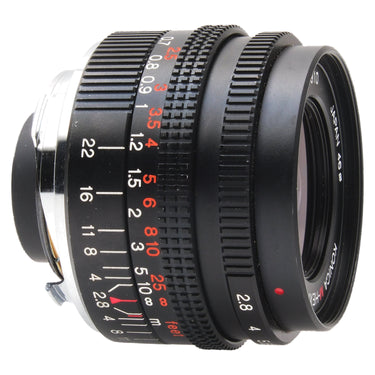 Konica 28mm f2.8 M-Hexanon lens side view showing focus and aperture rings