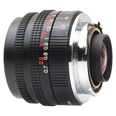 Konica 28mm f2.8 M-Hexanon lens rear three-quarter view showing mount and rear element