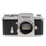 Nikon F silver film SLR front view with bare lens mount and Nikon nameplate