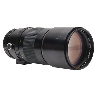 Minolta 300mm f4.5 Rokkor-X angled front view showing scratch on barrel