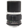Minolta 135mm f2.8 MC Tele Rokkor-PF lens standing upright with built-in hood extended and aperture scale