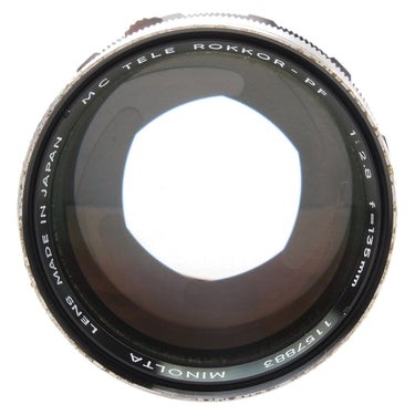 Minolta MC Tele Rokkor-PF front element with engraved lens name, focal length, and serial number