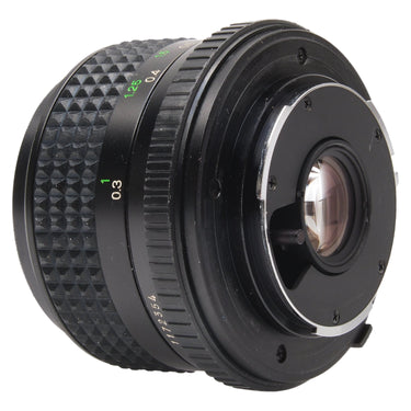 Minolta MD 28mm f2.8 W.Rokkor-X rear three-quarter view showing mount and rear element