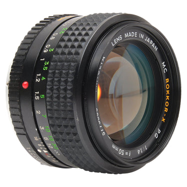 Minolta 50mm f1.4 MC Rokkor-X PG angled front view showing front glass and barrel