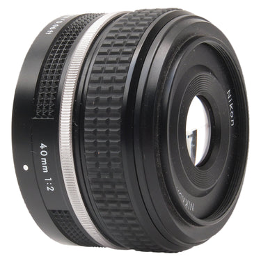 Nikon Z 40mm f2 SE angled front view with focus scale and silver ring