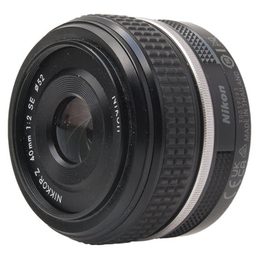 Nikon Z 40mm f2 SE angled view showing serial number and Made in Thailand