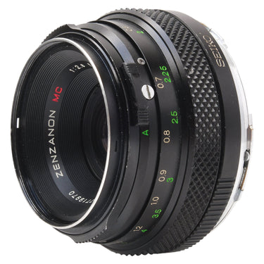 Zenza Bronica Zenzanon MC 75mm f2.8 angled view showing Seiko shutter housing and distance scale