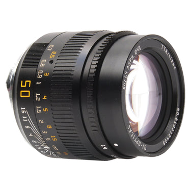 TTArtisan 50mm f1.4 Asph angled view showing front glass and focus scale
