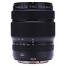 Fujifilm GF 32-64mm f4 R LM WR lens front three-quarter view showing barrel markings and zoom scale