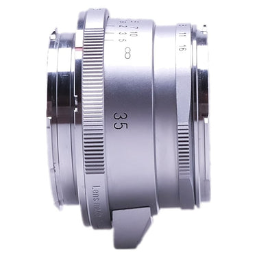 Voigtlander 35mm f2 Ultron silver side view showing focus ring and 35 marking