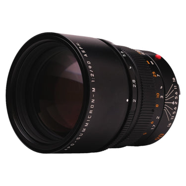 Leica 90mm f2 APO-Summicron-M ASPH angled front view with depth-of-field scale