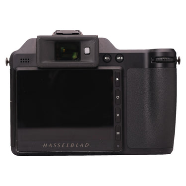Hasselblad X2D 100C rear view showing the LCD touchscreen, electronic viewfinder, and control buttons