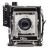 Graflex Speed Graphic front view with 135mm f4.7 Graphex Optar lens and shutter dial