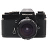 Nikon Nikkormat EL front view with 28mm f3.5 Nikkor-H lens mounted