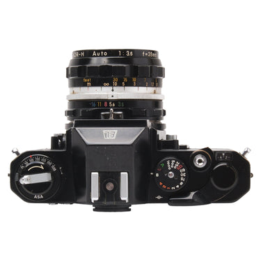 Nikon Nikkormat EL top plate with ASA dial, shutter dial, and 28mm lens
