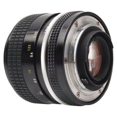 Nikon Nikkor 35mm f2 lens angled rear view showing F mount and rear element