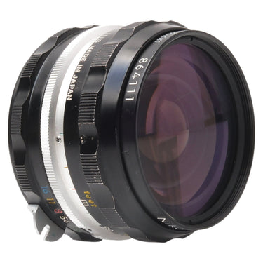 Nikon Nikkor-H.C 28mm f3.5 side view showing serial 864111 and Made in Japan engraving