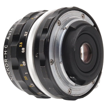 Nikon Nikkor-H.C 28mm f3.5 rear three-quarter view showing F mount and rear element