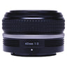 Nikon NIKKOR Z 40mm f2 SE lens side view showing focus ring and 40mm 1:2 marking