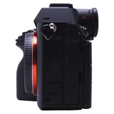 Sony Alpha 7R V side view showing mount collar and strap lug