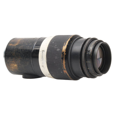 Leica Hektor 13.5cm f4.5 side view showing front glass, distance scale, and brassed barrel