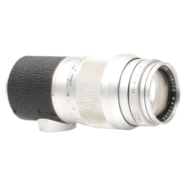 Leica 135mm Elmar angled view showing front element and chrome barrel