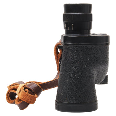 Nikon 6x30 binoculars side view with vintage leather neck strap