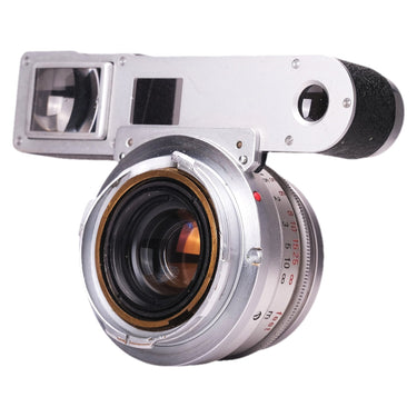 Rear three-quarter view of Leica Summicron showing M mount and rear glass etching