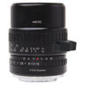 TTArtisan 40mm f2.8 Macro lens standing upright showing focus scale, aperture ring, and MACRO barrel