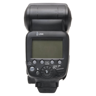 Canon Speedlite rear view with LCD panel, mode buttons, and power switch