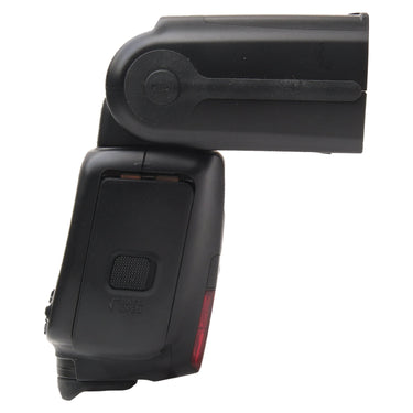 Canon Speedlite left side with battery compartment door and PUSH bounce release