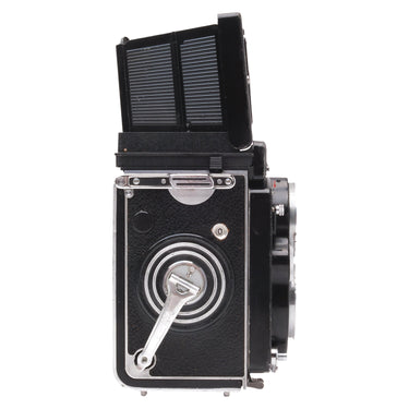 Rolleiflex 3.5F side view with waist-level finder open and advance crank