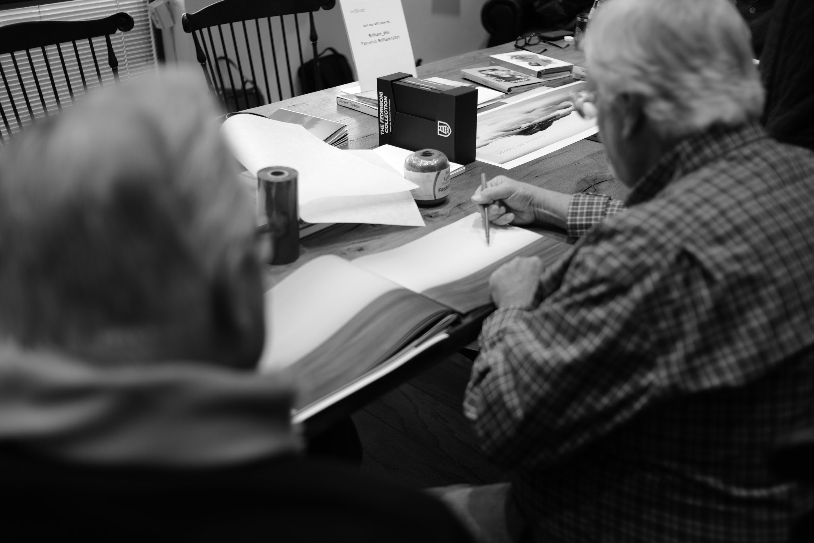 Reviewing materials at Brilliant Graphics