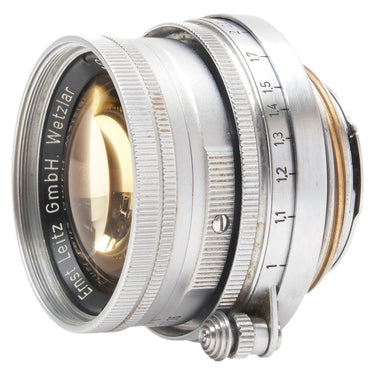 Leica 5cm f2 Summicron angled front view showing front element and depth of field scale